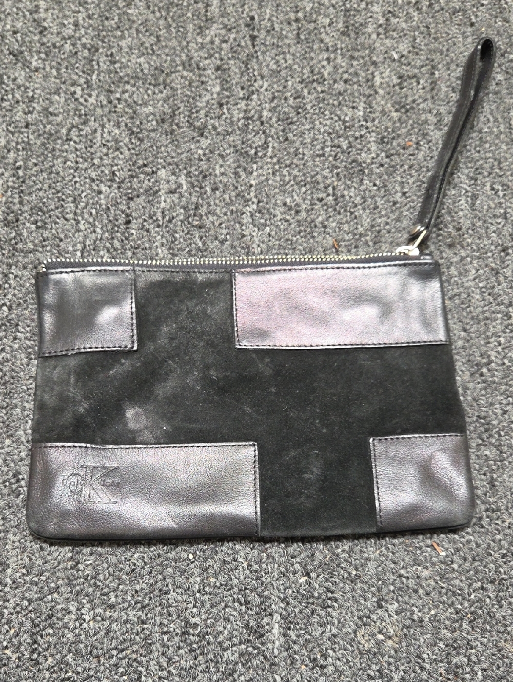 Calvin Klein Black Suede Wristlet with Silver Logo Plate